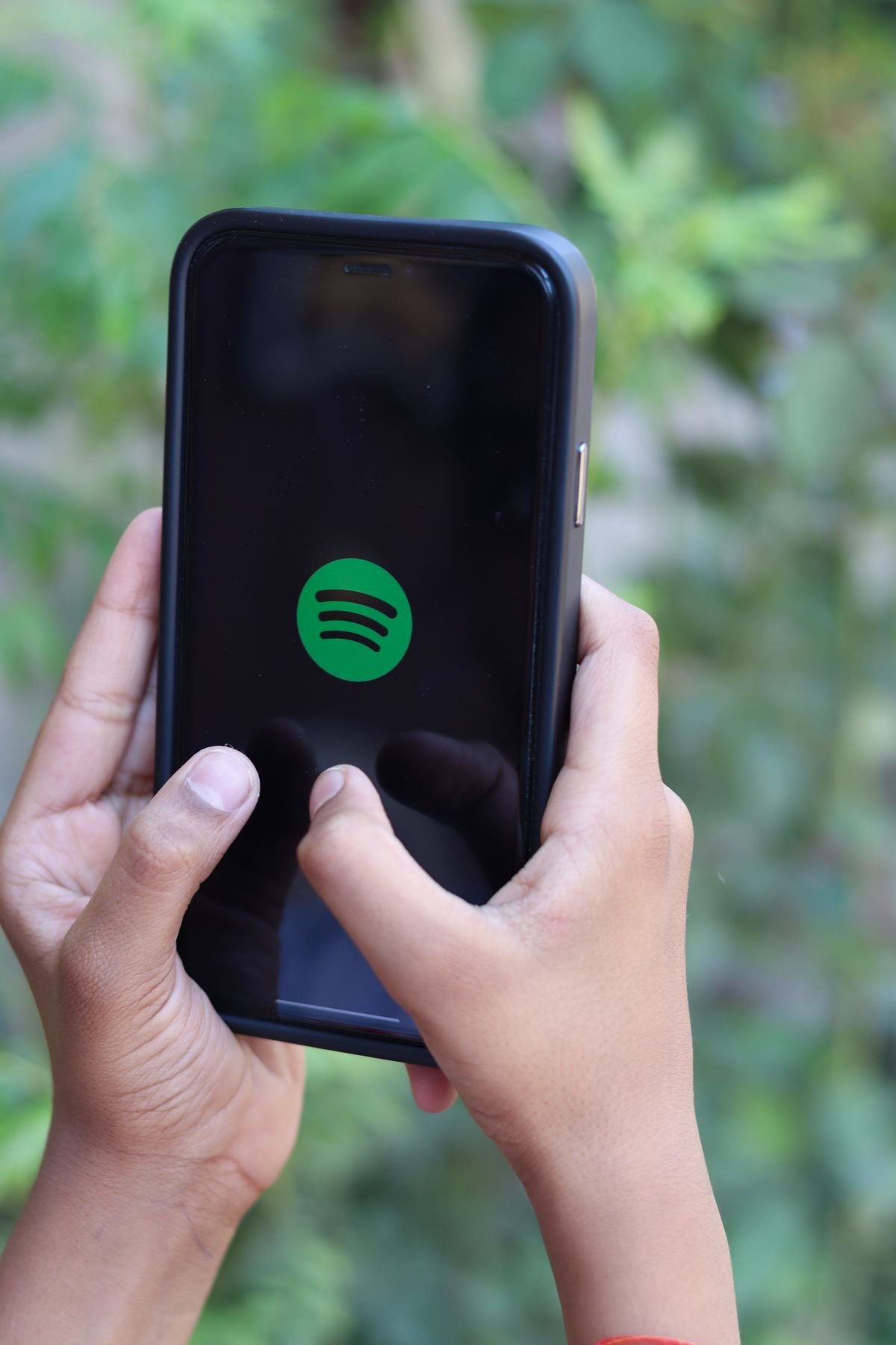 Spotify en el celular — gestión de playlists